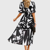 Merlin - Flattering ziedains midi kleita