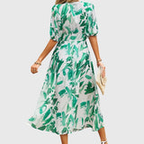 Merlin - Flattering ziedains midi kleita