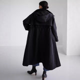Damen wasserabweisender Oversize-Regenmantel mit Kapuze und A-Linie