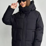 Damen Oversized Steppjacke mit Kapuze und integrierten Taschen