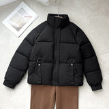 Damen kurze Steppjacke mit hohem Stehkragen und D-Ring-Tasche