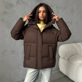 Damen Oversized Steppjacke mit Kapuze und integrierten Taschen