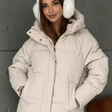 Damen Oversized Steppjacke mit Kapuze und integrierten Taschen