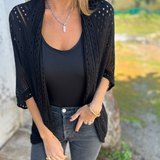 Eleganta jaka ar adītu caurumu dizainu
