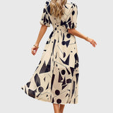 Merlin - Flattering ziedains midi kleita
